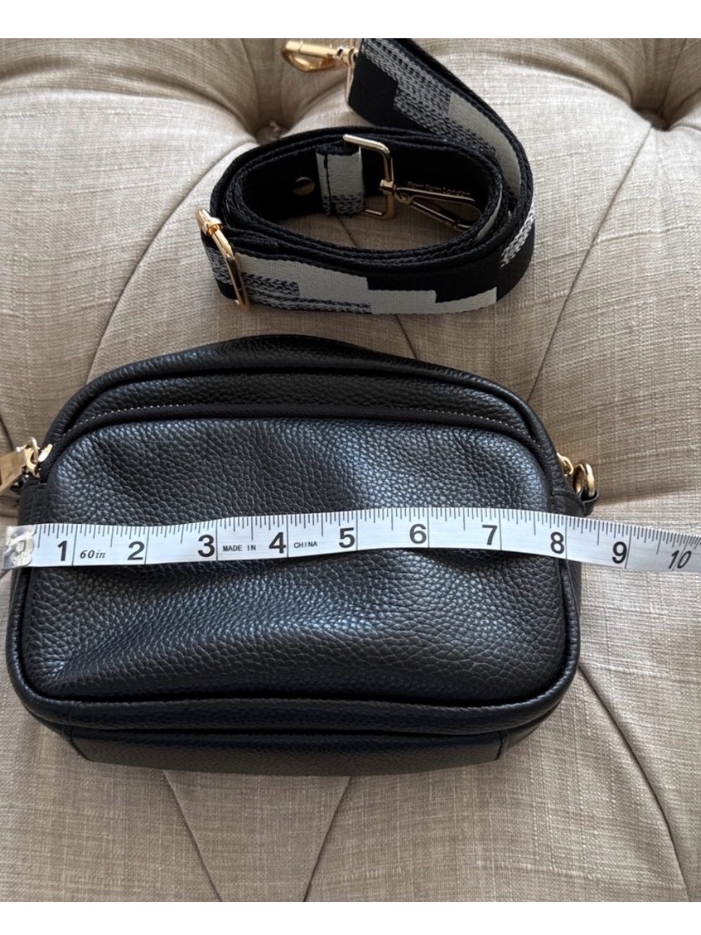 Compact Black Pebble Crossbody with Patterned Strap - Picture 9 of 12